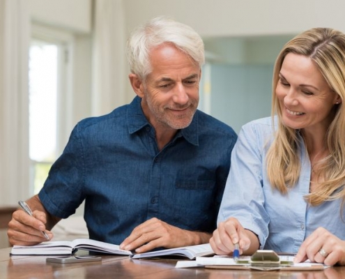Older couple engaged in retirement planning.
