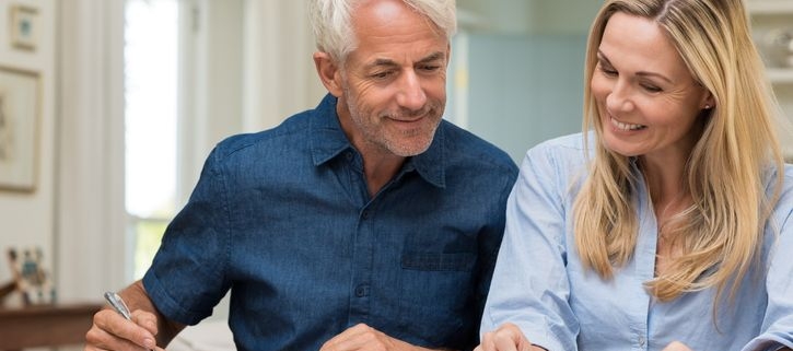Older couple engaged in retirement planning.