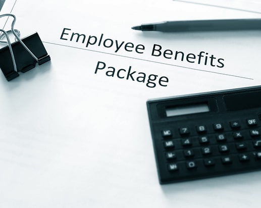 Employee Benefits Package with calculator and paper clip